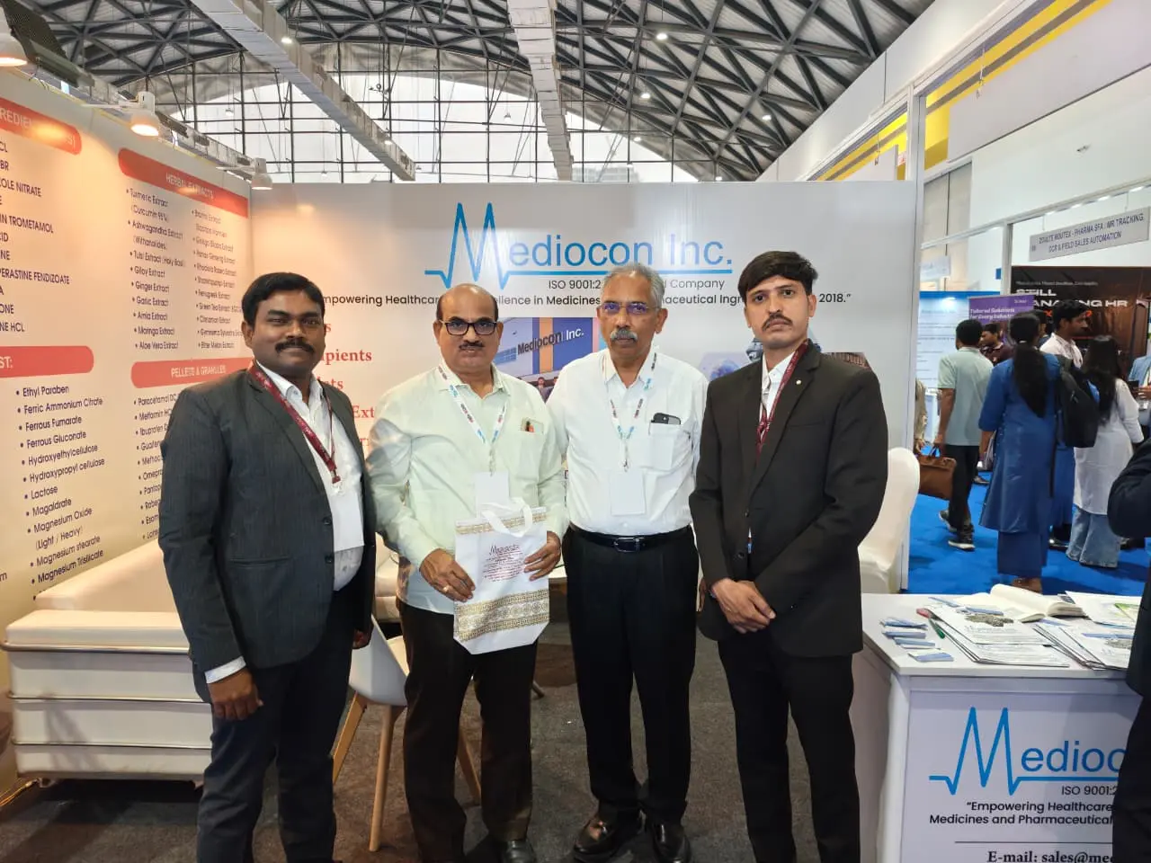 Business meeting at the Mediocon Inc exhibition booth in Hyderabad